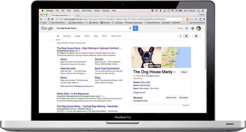 The Dog House Manly homepage on a laptop